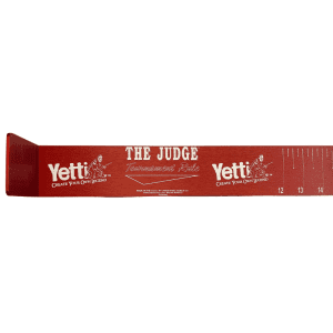 A red fish ruler with white text and Yetti Fish House logo.