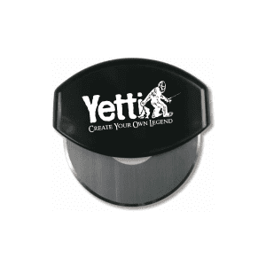 A round pizza cutter with a black handle with a white Yetti Fish House logo